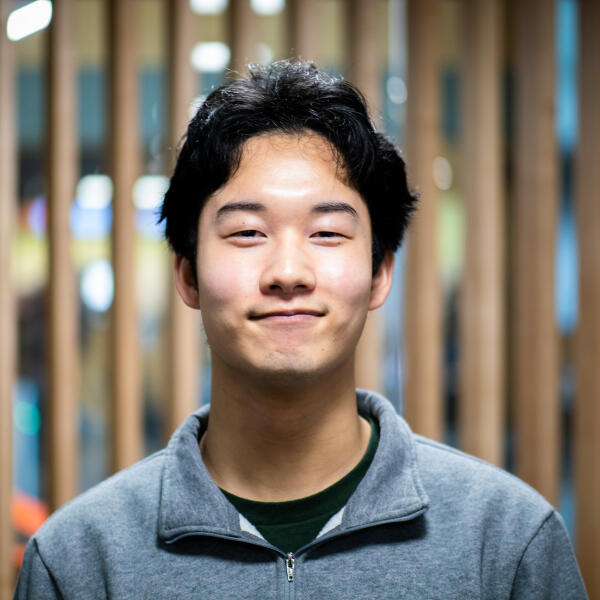 Headshot of personal trainer Saan Chang.